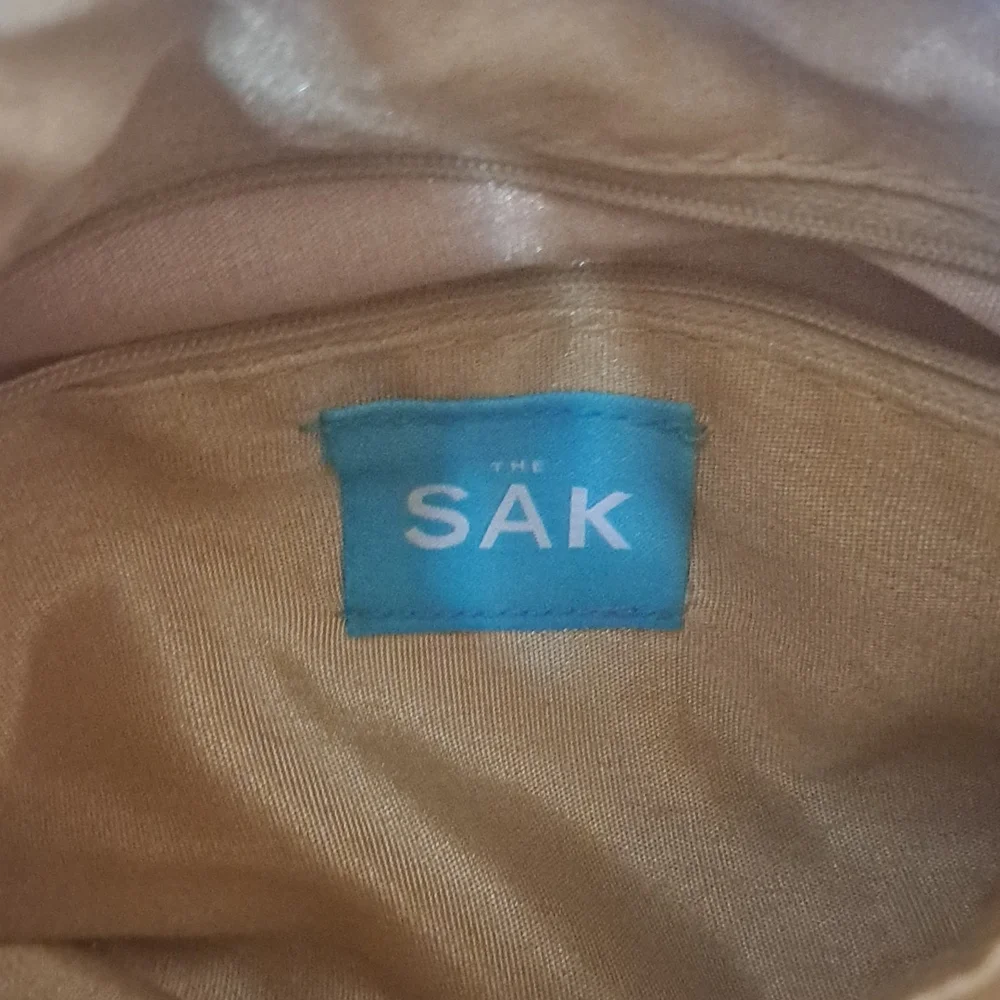 The Sak hobo style woven ribbon handbag